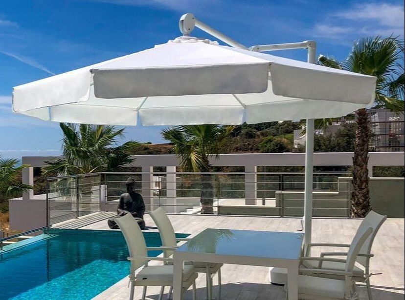 UMBRELLAS AND PARASOLS FOR TERRACE AND SWIMMING POOL